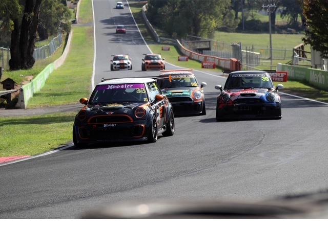 Three track Minis running down the hill at Mount Panorama