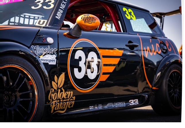 Side livery close-up, number 33 roundel and sponsor decals